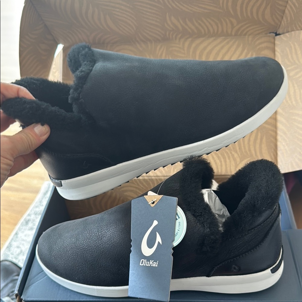 OluKai Black Boots with High-Top Design and Soft Material